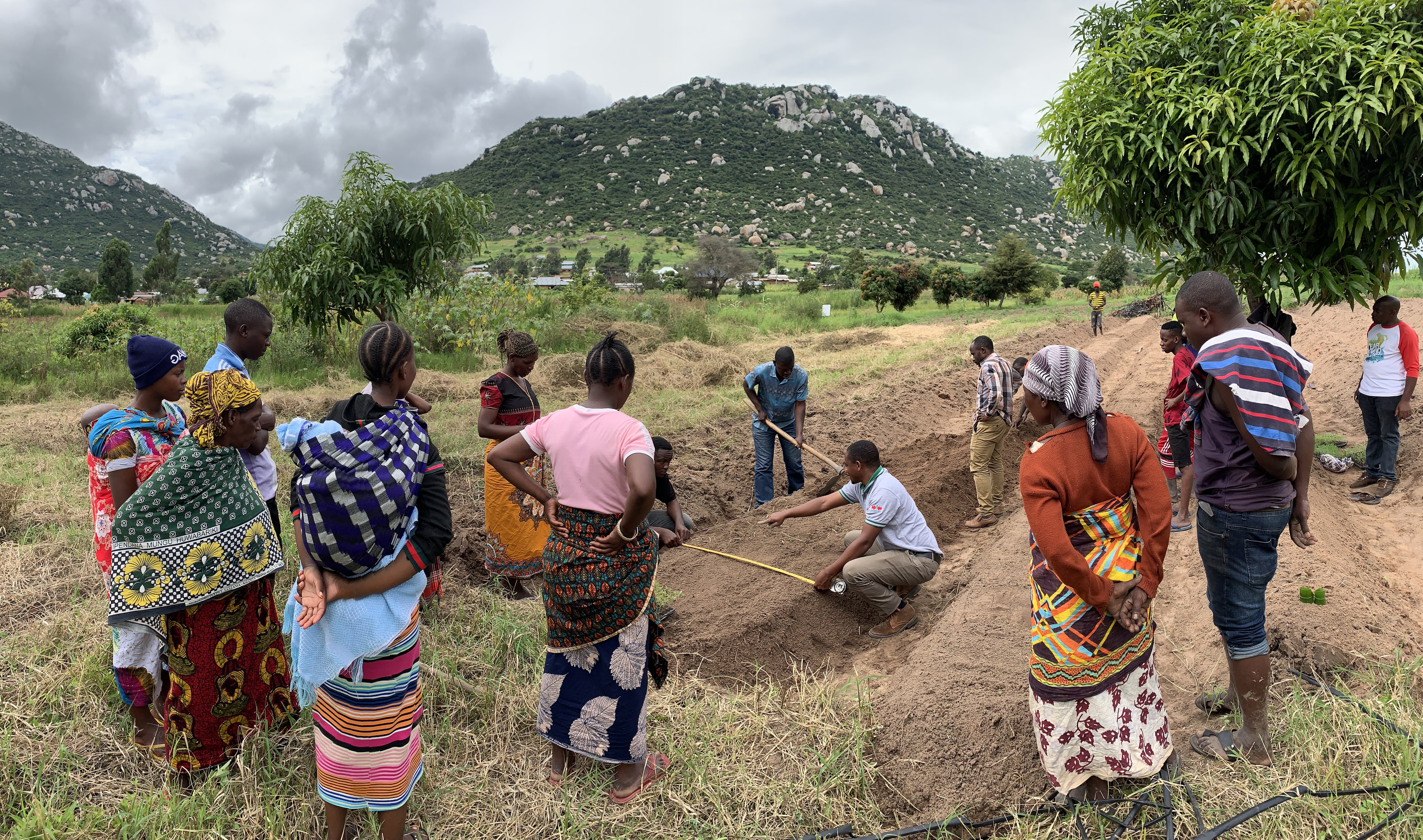 Farmers learning to make a raised bed in Tanzania