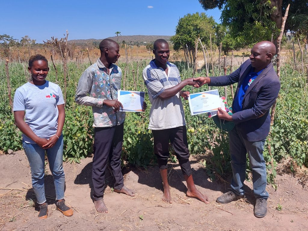 Knowledge Transfer Manager congratulates farmers on completing courses