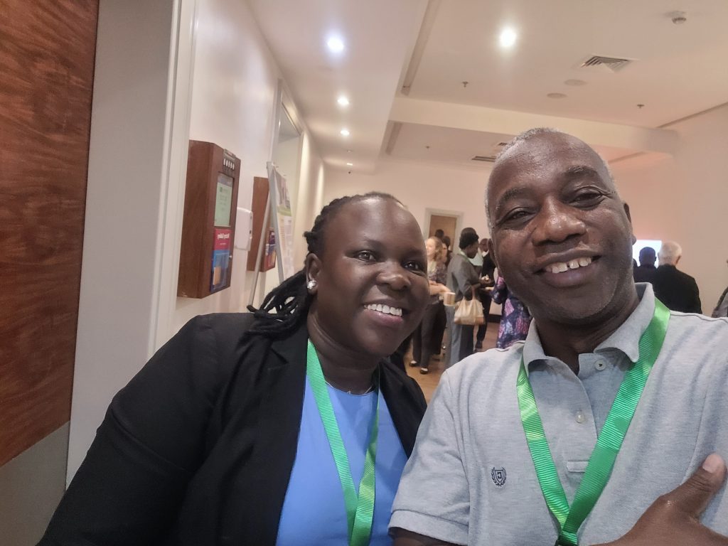Annet Kiiza and Elijah Mawashayenyi at ISSD Conference