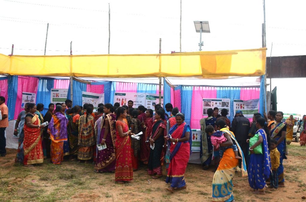 Smallholder farmers from Koenjhar and other districts visiting the booths organized for knowledge dissemination at the CoE