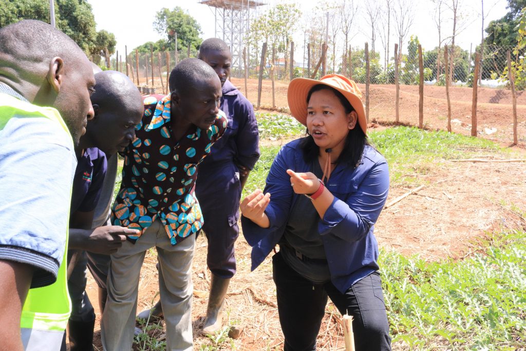 Lysette Lacambra with EWS-KT Uganda field staff