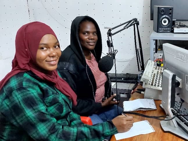 EWS-KT Technical Field Officers Hadija Lihumbo and Lydia Mkopa during a radio session