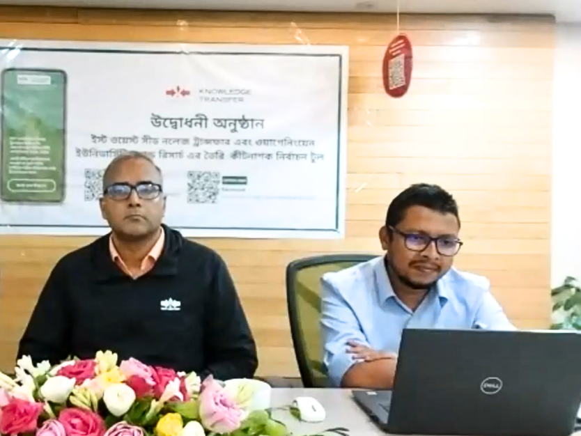 East-West Seed Bangladesh Country Manager Mostafa Kamal and EWS-KT Bangladesh Technical Manager Eamad Mustafa sit at a table during the virtual launch of the Pesticide Selection Tool