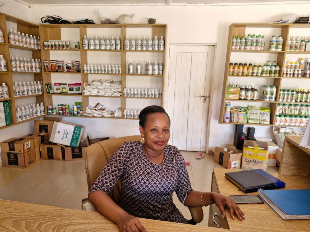 Agro-input shop owner Grace Kamwine in her shop.