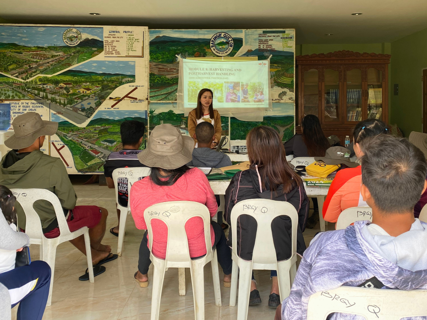 EWS-KT staff holds a classroom training on harvesting and post-harvest handling.