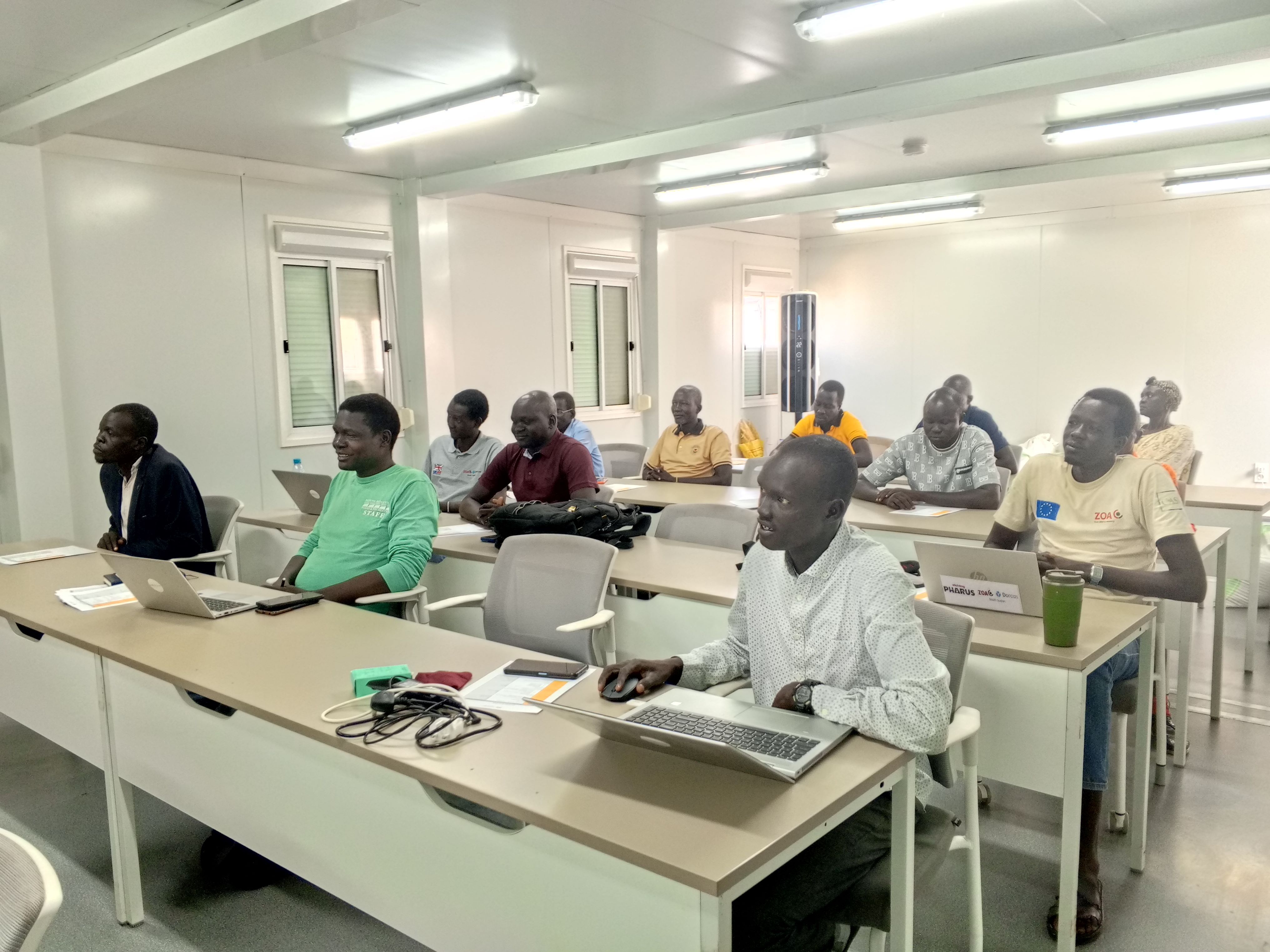 Agricultural extension specialists learn in a classroom setting during a training of trainers in Bor, South Sudan.
