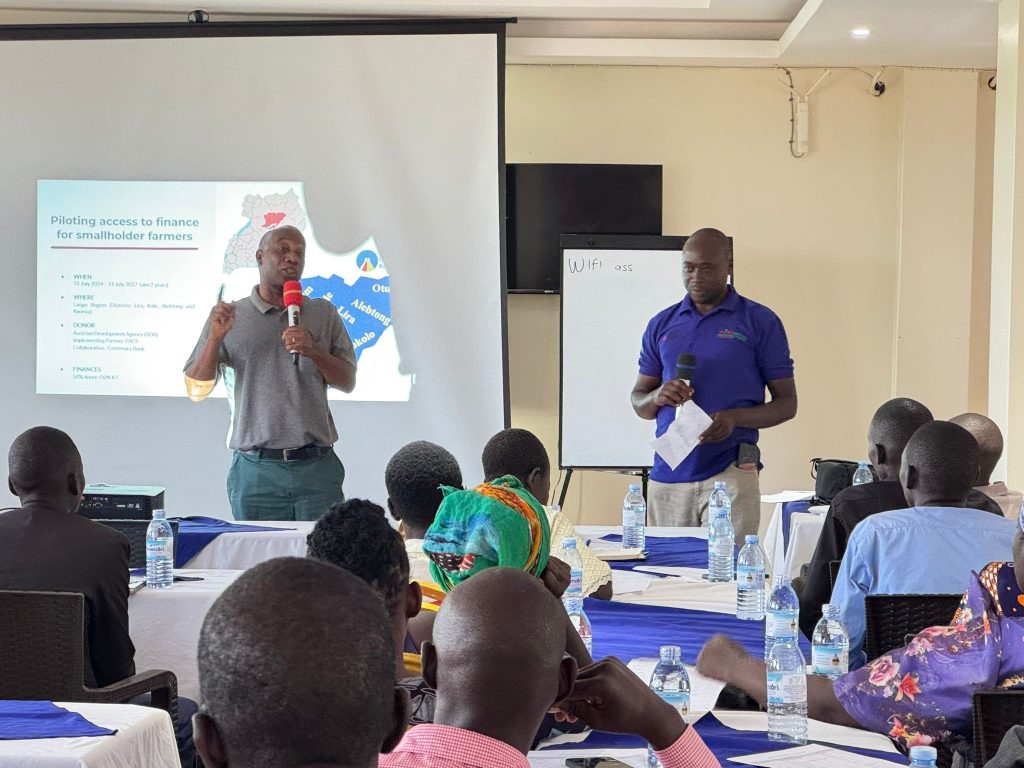 Elijah Mwashayenyi, EWS-KT’s Head of Knowledge Transfer in Africa, speaking at the farmer certification event.