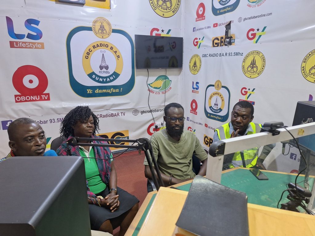 EWS-KT Ghana staff and guests in radio studio.