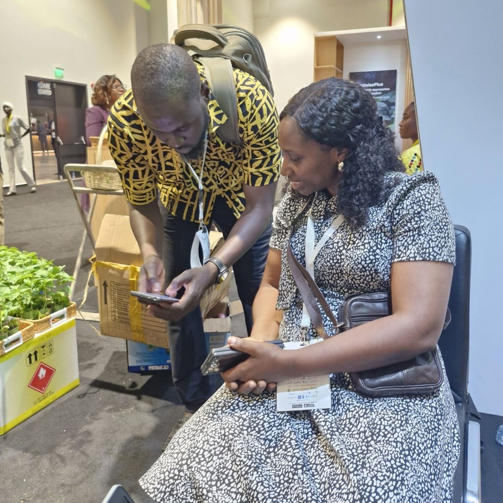 Ruth Ardzard, Knowledge Transfer Manager for Nigeria, meets with a visitor at Africa Food Systems Forum 2025.